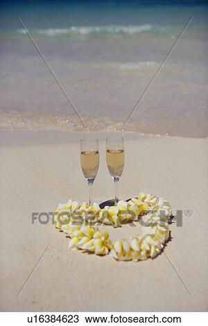 Elevated view of a garland in shape of heart around wineglasses View Large Photo Image Stock Image - Elevated view of a garland in shape of heart around wineglasses. Fotosearch