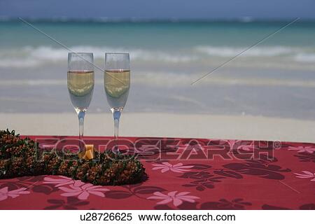 Wine glasses filled with drink in foreground View Large Photo Image Stock Photography - Wine glasses filled with drink in foreground. Fotosearch