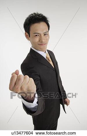 Picture - Man posing for the camera, portrait. Fotosearch