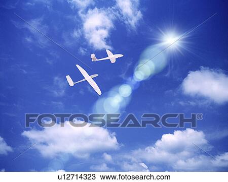 View of airplanes flying in blue sky (digital composite) View Large Photo Image Stock Image - View of airplanes flying in blue sky (digital composite). Fotosearch