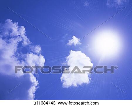 Stock Image - View of blue sky with clouds. Fotosearch