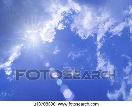 Stock Image - View of blue sky with clouds. Fotosearch