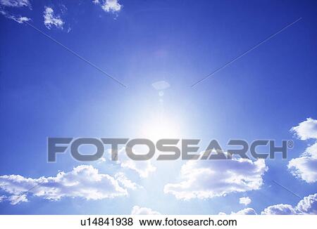 Stock Photo - View of blue sky with clouds. Fotosearch