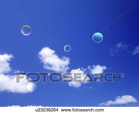 Picture - View of bubbles amid sky (digital composite). Fotosearch