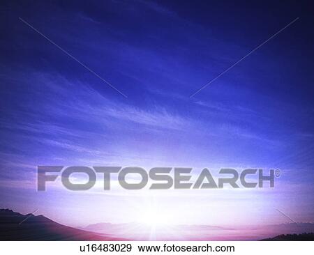 View of early morning sun on landscape View Large Photo Image Stock Photo - View of early morning sun on landscape. Fotosearch