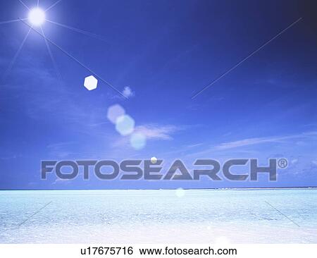 View of sea and sun rays View Large Photo Image Stock Photograph - View of sea and sun rays. Fotosearch