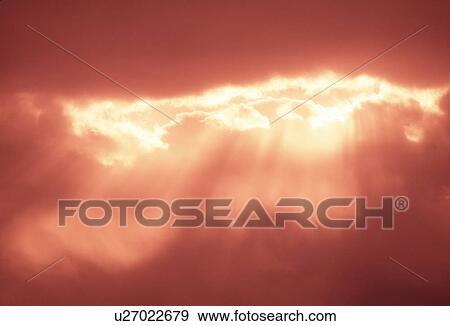 View of sunlight through clouds View Large Photo Image Stock Photo - View of sunlight through clouds. Fotosearch