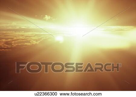 View of sunshine through clouds View Large Photo Image Stock Image - View of sunshine through clouds. Fotosearch