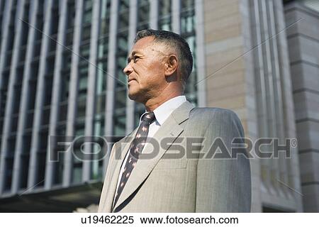 Profile of a businessman View Large Photo Image Stock Photography - Profile of a businessman. Fotosearch