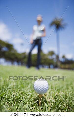 Golf ball placed on grass View Large Photo Image Stock Image - Golf ball placed on grass. Fotosearch