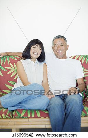 Portrait of a couple smiling View Large Photo Image Stock Image - Portrait of a couple smiling. Fotosearch