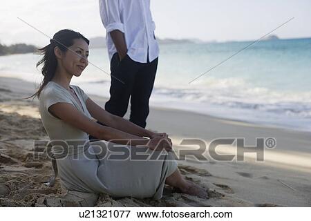 A young couple at beach View Large Photo Image Stock Photo - A young couple at beach. Fotosearch
