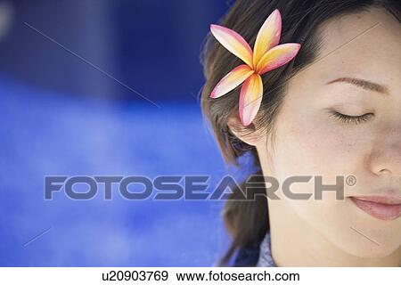 Stock Photo - Close-up of a young woman. Fotosearch