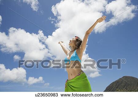View of a woman with arms out View Large Photo Image Stock Image - View of a woman with arms out. Fotosearch