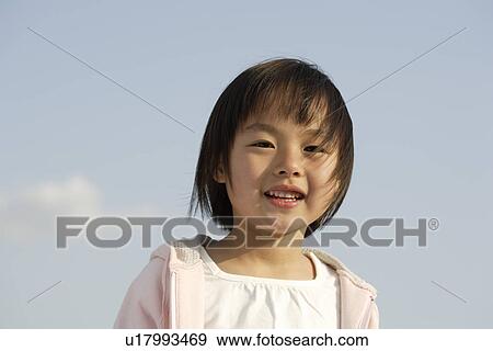 Portrait of a preschooler girl smiling View Large Photo Image Stock Photo - Portrait of a preschooler girl smiling. Fotosearch