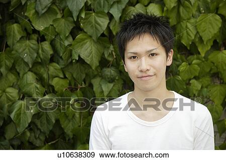Stock Photo - Portrait of a young man. Fotosearch