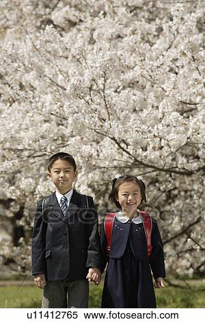 Portrait of boy and girl smiling View Large Photo Image Stock Photography - Portrait of boy and girl smiling. Fotosearch