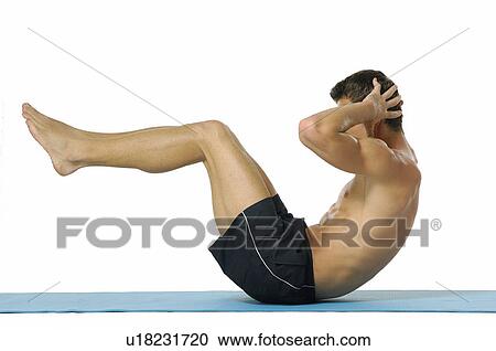 Side profile of a young man doing sit-ups View Large Photo Image Stock Image - Side profile of a young man doing sit-ups. Fotosearch