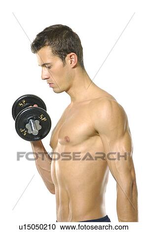 Stock Image - Young man exercising with a hand weight. Fotosearch
