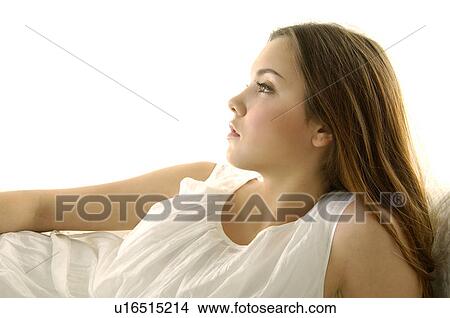 Picture - Close-up of a young woman looking away. Fotosearch