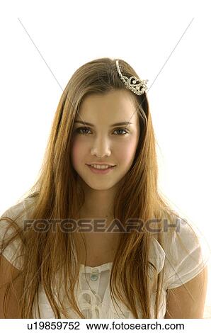 Portrait of a young woman wearing a tiara View Large Photo Image Stock Image - Portrait of a young woman wearing a tiara. Fotosearch