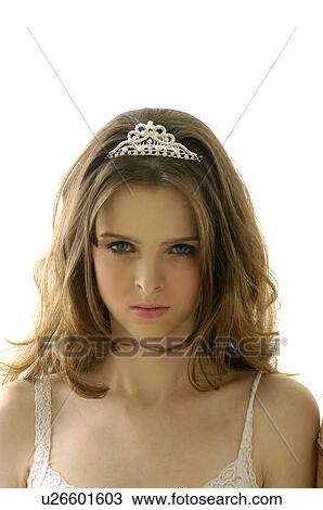 Portrait of a young woman wearing a tiara View Large Photo Image Stock Image - Portrait of a young woman wearing a tiara. Fotosearch