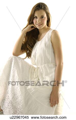 Stock Photography - Portrait of a young woman smiling. Fotosearch