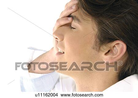 Picture - Close-up of a young man smiling. Fotosearch