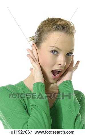 Portrait of a young woman shouting View Large Photo Image Stock Photo - Portrait of a young woman shouting. Fotosearch