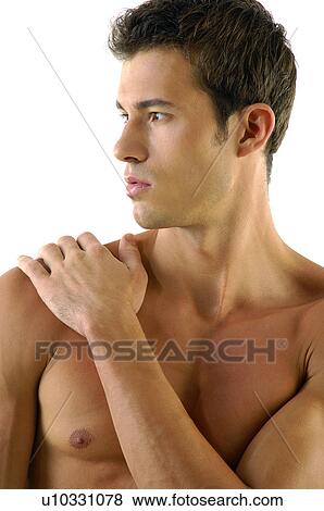 Young man flexing his muscles View Large Photo Image Stock Photo - Young man flexing his muscles. Fotosearch