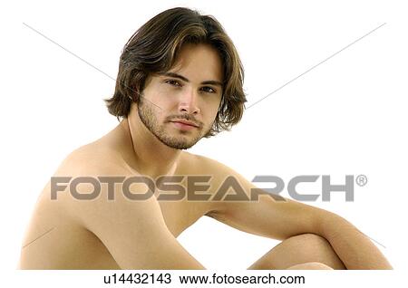 Stock Image - Portrait of a young man posing. Fotosearch