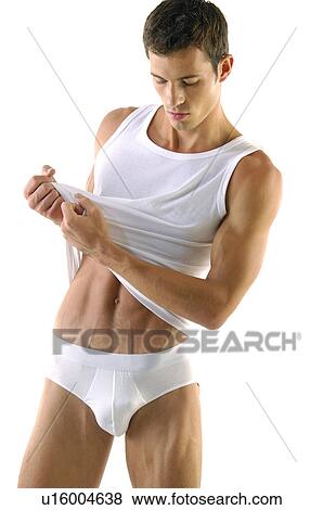 Young man wearing vest View Large Photo Image Stock Photo - Young man wearing vest. Fotosearch