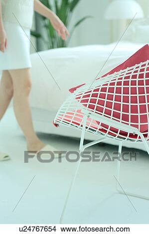 A young woman in bedroom View Large Photo Image Picture - A young woman in bedroom. Fotosearch