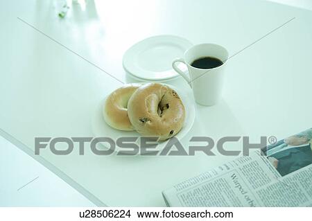 Bagel and coffee View Large Photo Image Picture - Bagel and coffee. Fotosearch