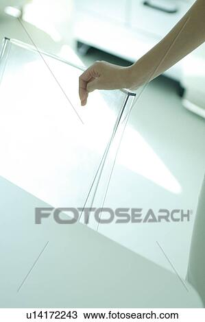 Stock Image - Close-up of a young woman's hand. Fotosearch