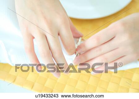 Close-up of a young woman's hand View Large Photo Image Stock Image - Close-up of a young woman's hand. Fotosearch