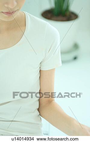 Close-up of a young woman's midsection View Large Photo Image Picture - Close-up of a young woman's midsection. Fotosearch