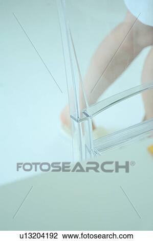 Stock Image - Young woman's legs. Fotosearch