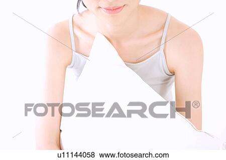 Portrait of a young woman, close-up View Large Photo Image Stock Photo - Portrait of a young woman, close-up. Fotosearch