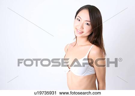 Portrait of a young woman in bikini View Large Photo Image Stock Image - Portrait of a young woman in bikini. Fotosearch