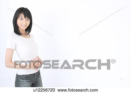 Portrait of a young woman View Large Photo Image Stock Image - Portrait of a young woman. Fotosearch