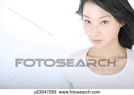 Stock Image - Portrait of a young woman. Fotosearch
