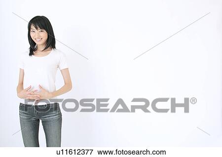 Stock Photo - Portrait of a young woman. Fotosearch