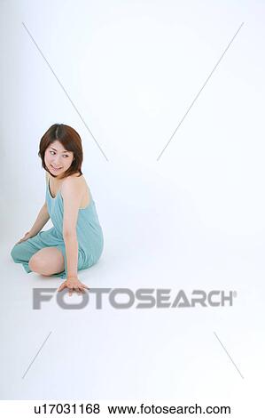 Stock Photo - Portrait of a young woman. Fotosearch