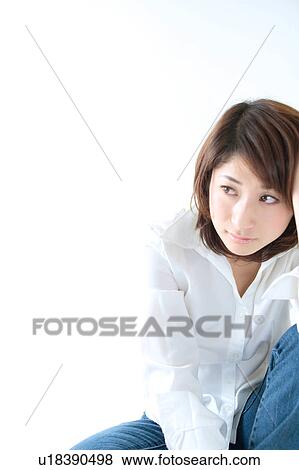 Portrait of a young woman View Large Photo Image Stock Photo - Portrait of a young woman. Fotosearch