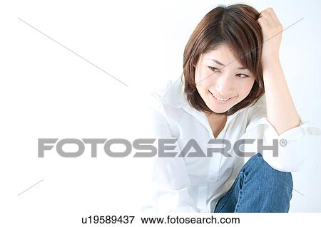Portrait of a young woman View Large Photo Image Stock Photo - Portrait of a young woman. Fotosearch