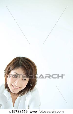 Portrait of a young woman View Large Photo Image Stock Photograph - Portrait of a young woman. Fotosearch