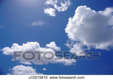 Blue sky and clouds View Large Photo Image Stock Image - Blue sky and clouds. Fotosearch