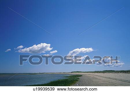 Blue sky and clouds View Large Photo Image Stock Photo - Blue sky and clouds. Fotosearch