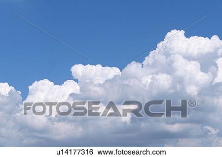 Blue sky and clouds View Large Photo Image Stock Photograph - Blue sky and clouds. Fotosearch